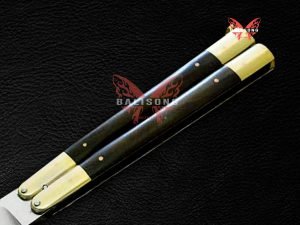 BF-69 Leopard Cat butterfly knife handle detail — kamagong wood inserts in brass