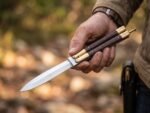 Hare balisong butterfly knife held in hand