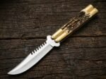 Banded Sugar Ant balisong butterfly knife open with the blade showing