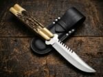 Banded Sugar Ant balisong butterfly knife shown with its leather sheath