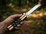 Bumblebee balisong butterfly knife held in hand