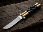 Bumblebee balisong butterfly knife open with the blade showing