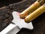 Close up of the Centipede balisong butterfly knife bolster and pivot