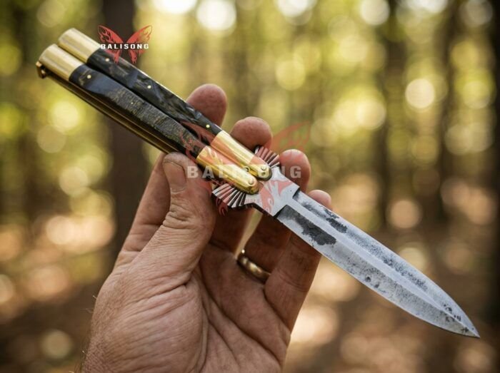 Crocodile balisong butterfly knife held in hand