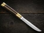 Falcon balisong butterfly knife open with the blade showing