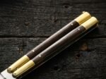 Close up of the Glow Worm balisong butterfly knife handle