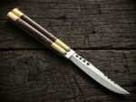 Glow Worm balisong butterfly knife open with the blade showing, second view