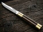 Hamster balisong butterfly knife open with the blade showing, second view