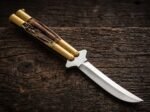 Centipede balisong butterfly knife open with the blade showing, second view