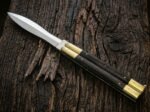 Ladybug balisong butterfly knife open with the blade showing