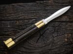 Ladybug balisong butterfly knife open with the blade showing, second view