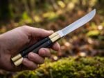 Leopard Cat balisong butterfly knife held in hand