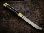 Leopard Cat balisong butterfly knife open with the blade showing