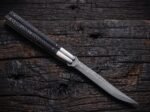 Ilog balisong butterfly knife open with the blade showing