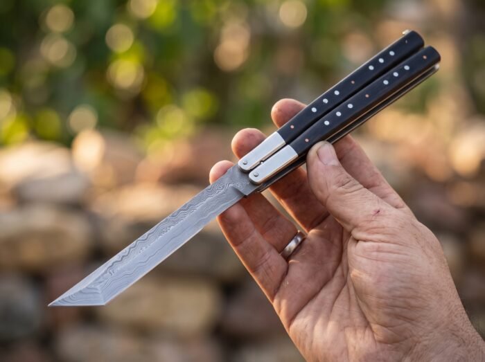 Dagat balisong butterfly knife held in hand