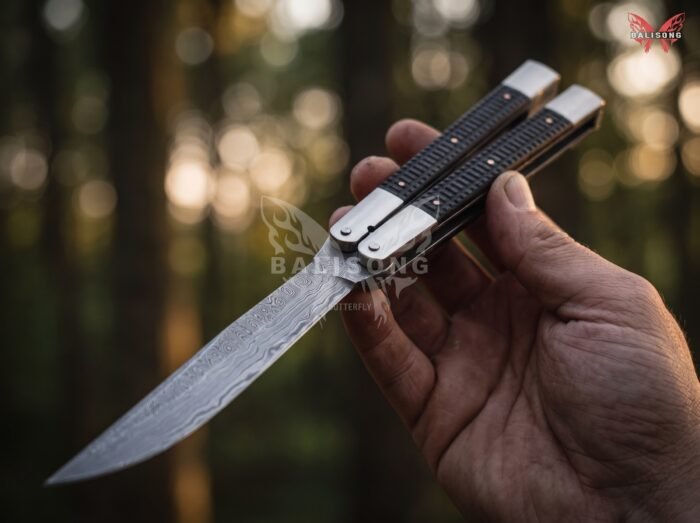 Alon balisong butterfly knife held in hand