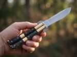 Tanglaw balisong butterfly knife held in hand