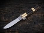 Tanglaw balisong butterfly knife open with the blade showing