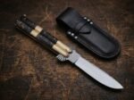 Tanglaw balisong butterfly knife shown with its leather sheath