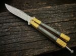 Ginto balisong butterfly knife open with the blade showing