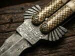 Close up of the Kalaw balisong butterfly knife bolster and pivot