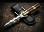 Lawin balisong butterfly knife shown with its leather sheath