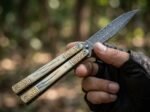 Sinauna balisong butterfly knife held in hand