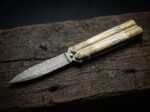 Sinauna balisong butterfly knife open with the blade showing