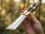 Tapang balisong butterfly knife held in hand