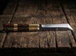Tapang balisong butterfly knife open with the blade showing, third view