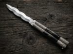 Uling balisong butterfly knife open with the blade showing, second view