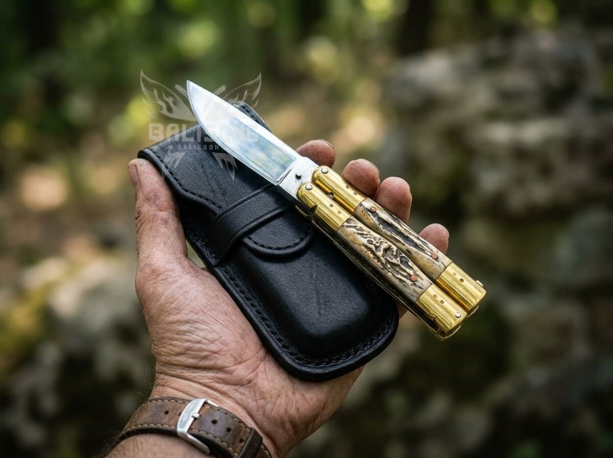 Bituin balisong butterfly knife held in hand Bituin balisong butterfly knife held in hand