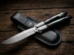 Hatinggabi balisong butterfly knife shown with its leather sheath, second view