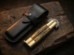 Lakas balisong butterfly knife shown with its leather sheath