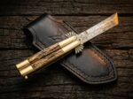 Lakas balisong butterfly knife shown with its leather sheath, third view