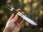 Sampaguita balisong butterfly knife held in hand