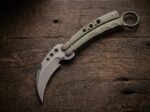 Dahon karambit balisong knife open with the blade showing