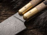 Close up of the Kislap balisong chef knife bolster and pivot