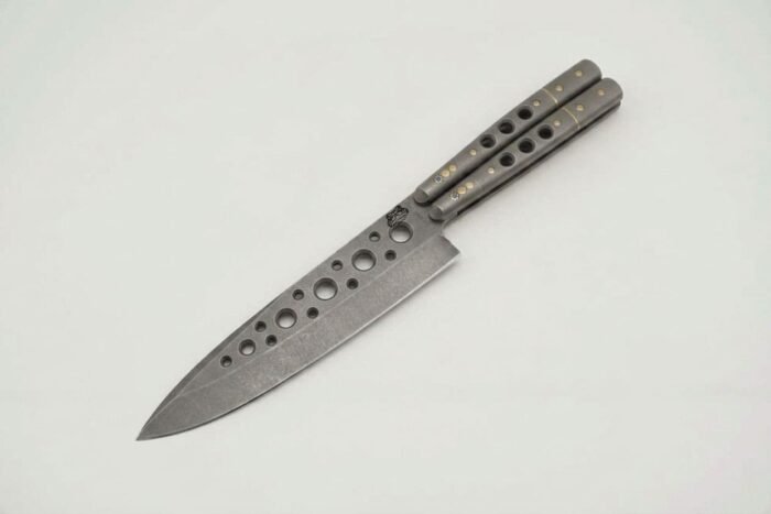 Handmade balisong chef knife with matte stone washed D2 blade, drilled hollows and ram horn handle