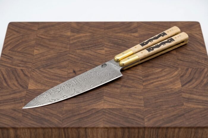 Handmade Damascus balisong chef knife with buffalo bone handle and brass bolsters