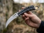 Kidlat karambit balisong knife held in hand