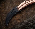 Liyab karambit balisong knife open with the blade showing