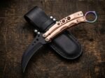 Liyab karambit balisong knife shown with its leather sheath
