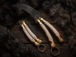 Ulan karambit balisong knife open with the blade showing
