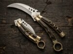 Ulap karambit balisong knife open with the blade showing, second view