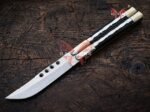 Close up of the Mule balisong butterfly knife kamagong wood handle with brass bolsters
